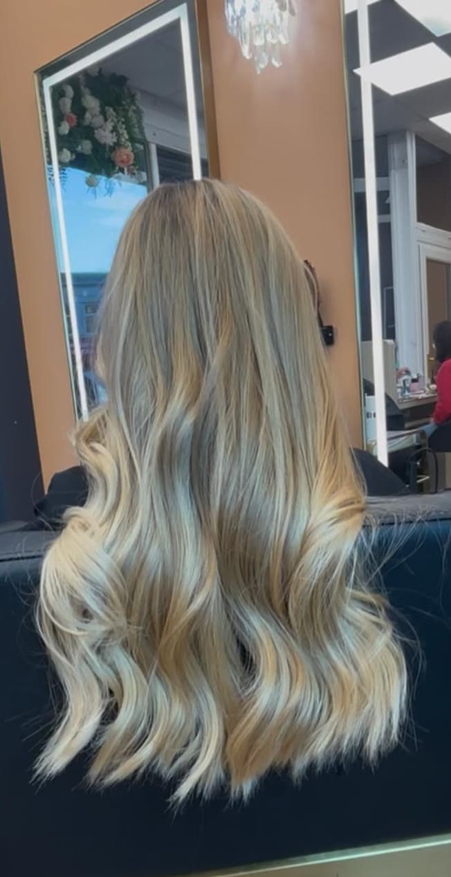 Long blonde waves hair styling near Newcastle