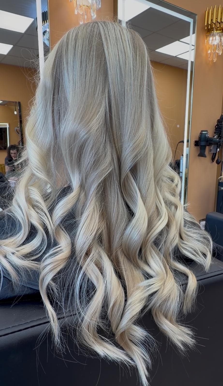 Platinum blonde curls at Sarah Hair & Beauty Whitley Bay
